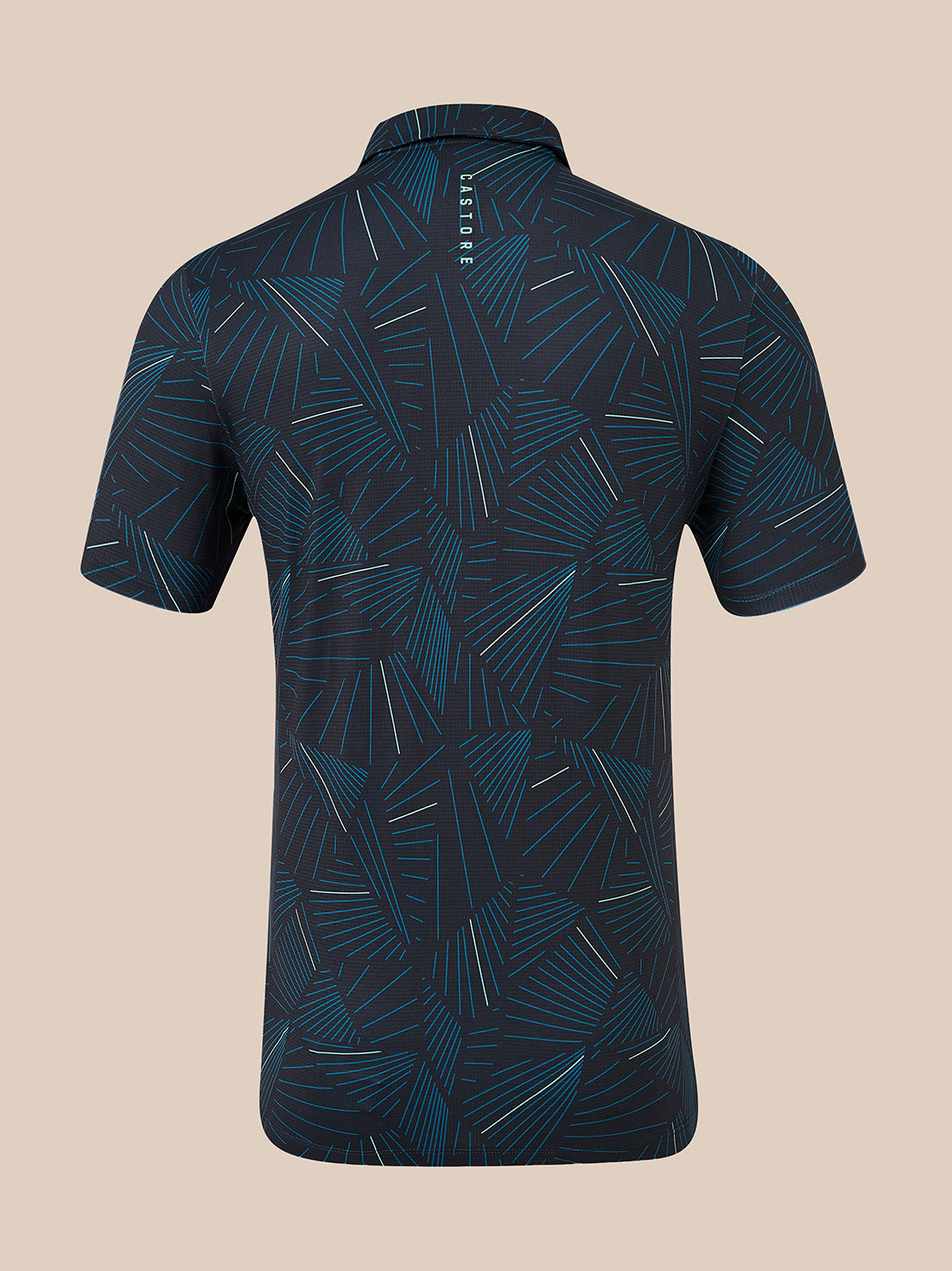 A short-sleeve polo shirt shown from the back, featuring an abstract geometric pattern in dark navy and teal with thin white line accents, set against a solid beige background.