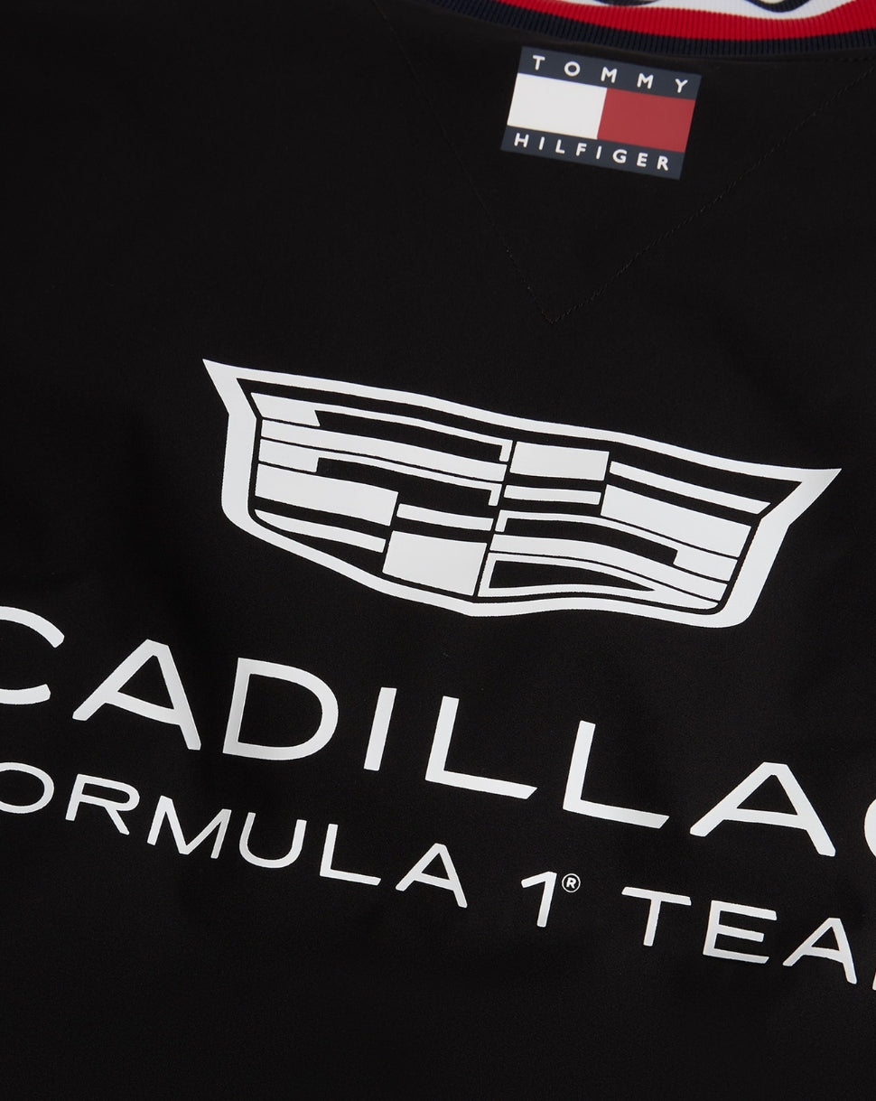 Black shirt with Cadillac Formula 1 Team logo and Tommy Hilfiger label.