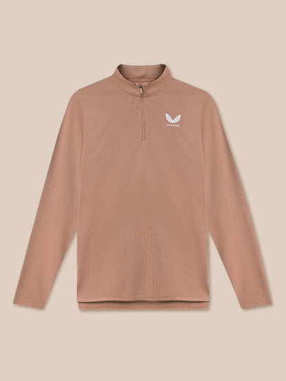 Brown long-sleeve shirt with a logo on a beige background