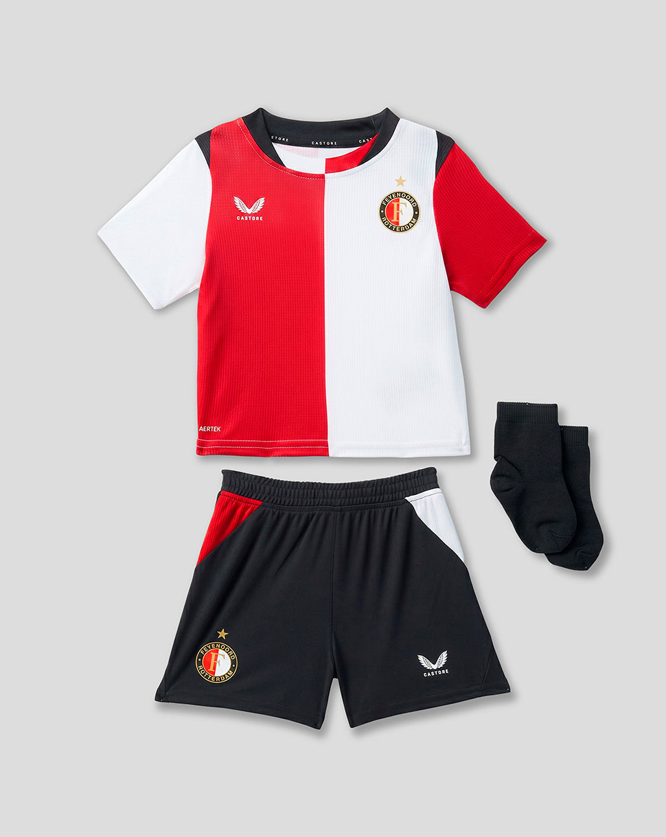 Infant Feyenoord home kit front view with red white split shirt black shorts and black socks