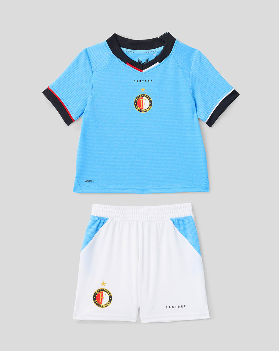 Infant Feyenoord 2026-27 away kit front view with light blue jersey and white shorts bearing the club crest