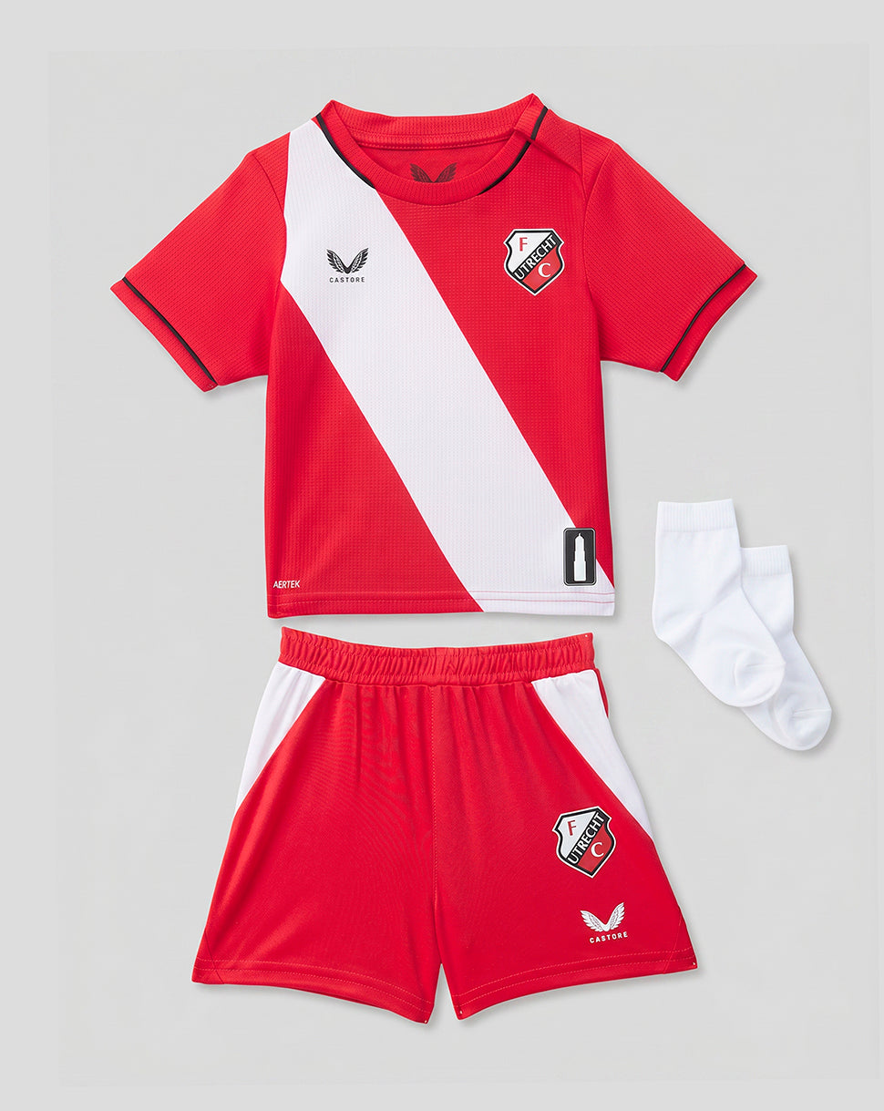 Red FC Utrecht baby kit with white diagonal sash, matching shorts and white socks