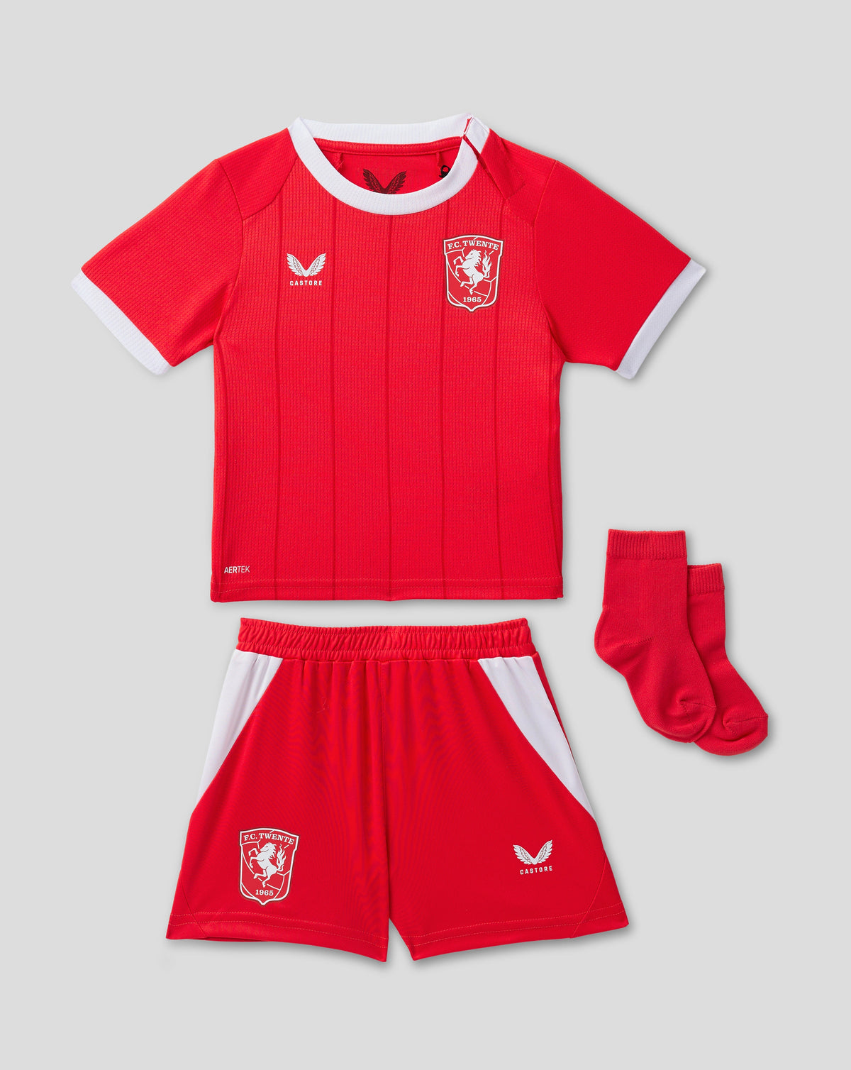 FC Twente infant home kit red jersey with white collar crest and matching shorts and socks