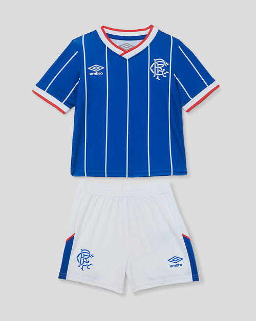 Blue and white sports jersey and shorts set with Umbro logo on a light gray background