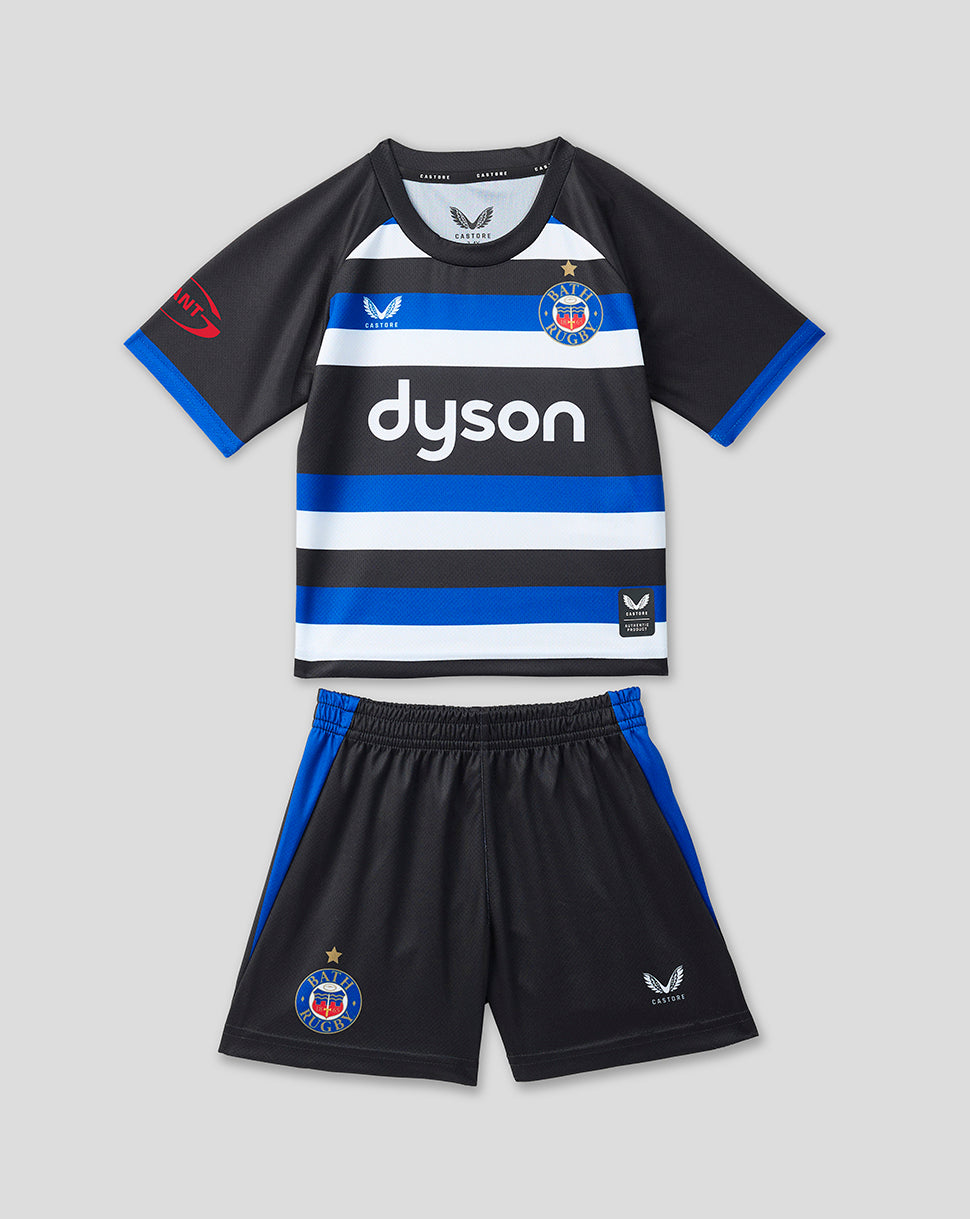A two-piece kids' rugby kit featuring a short-sleeve jersey and matching shorts. The jersey has horizontal black, white, and blue stripes with 'dyson' printed across the chest in white.