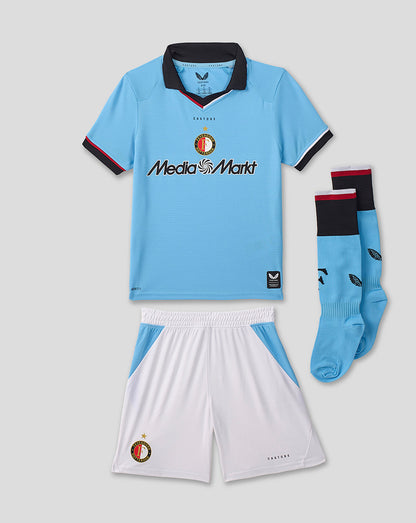 Junior Feyenoord 2026 2027 away kit laid flat showing light blue shirt white shorts and matching socks.