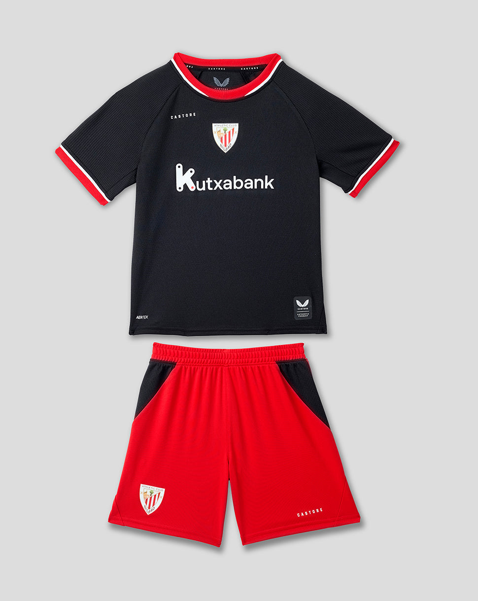 Athletic Club Junior 26/27 away kit front view with black jersey, red shorts, club crest and kutxabank sponsor