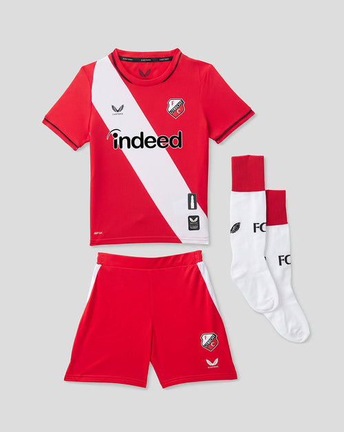 FC Utrecht junior home kit 26/27 red jersey with white diagonal sash, red shorts and white socks.