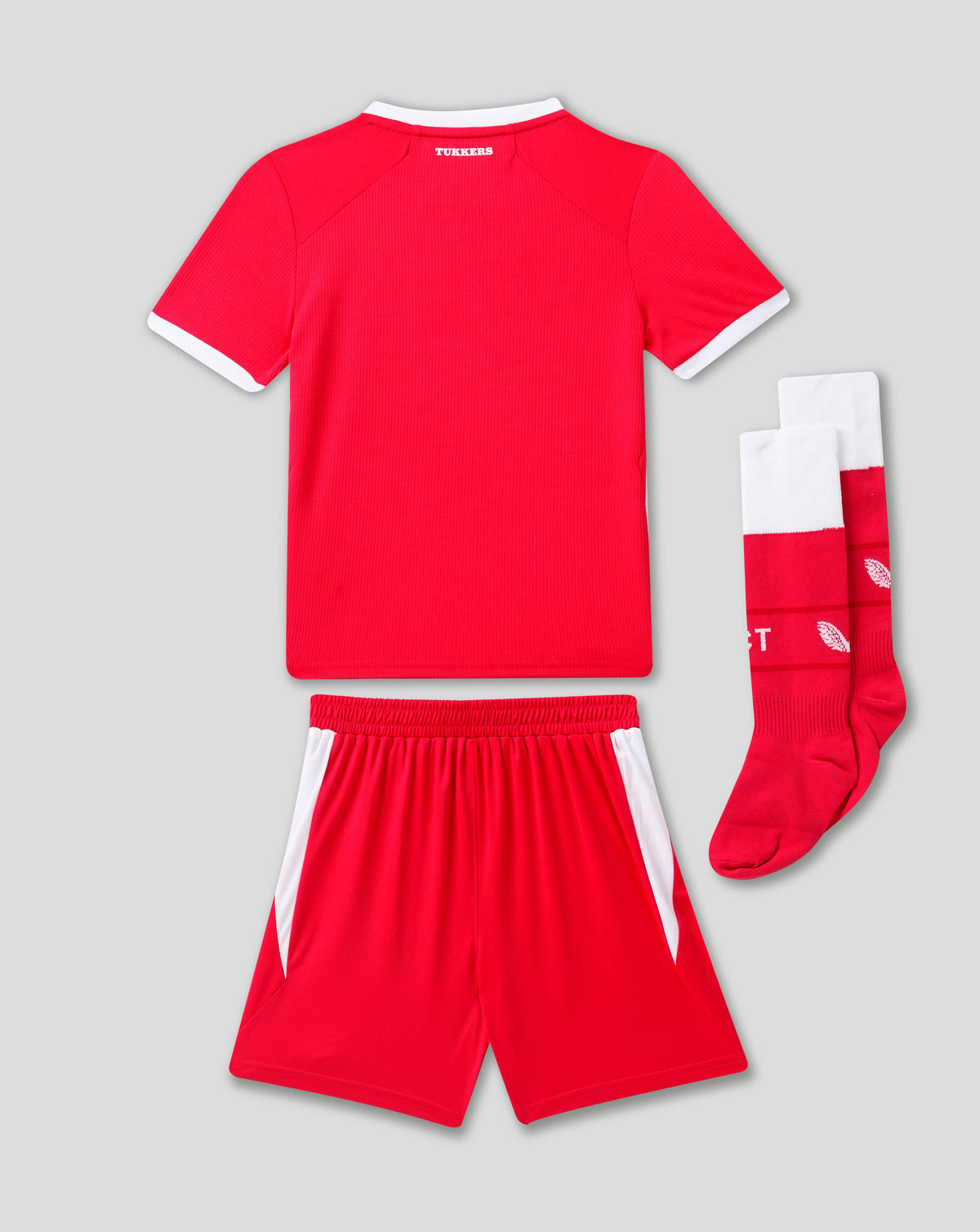 Back view of red FC Twente junior home jersey with white trim and matching shorts.