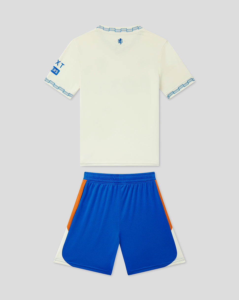 Children's sports outfit with a cream top and blue shorts on a light gray background