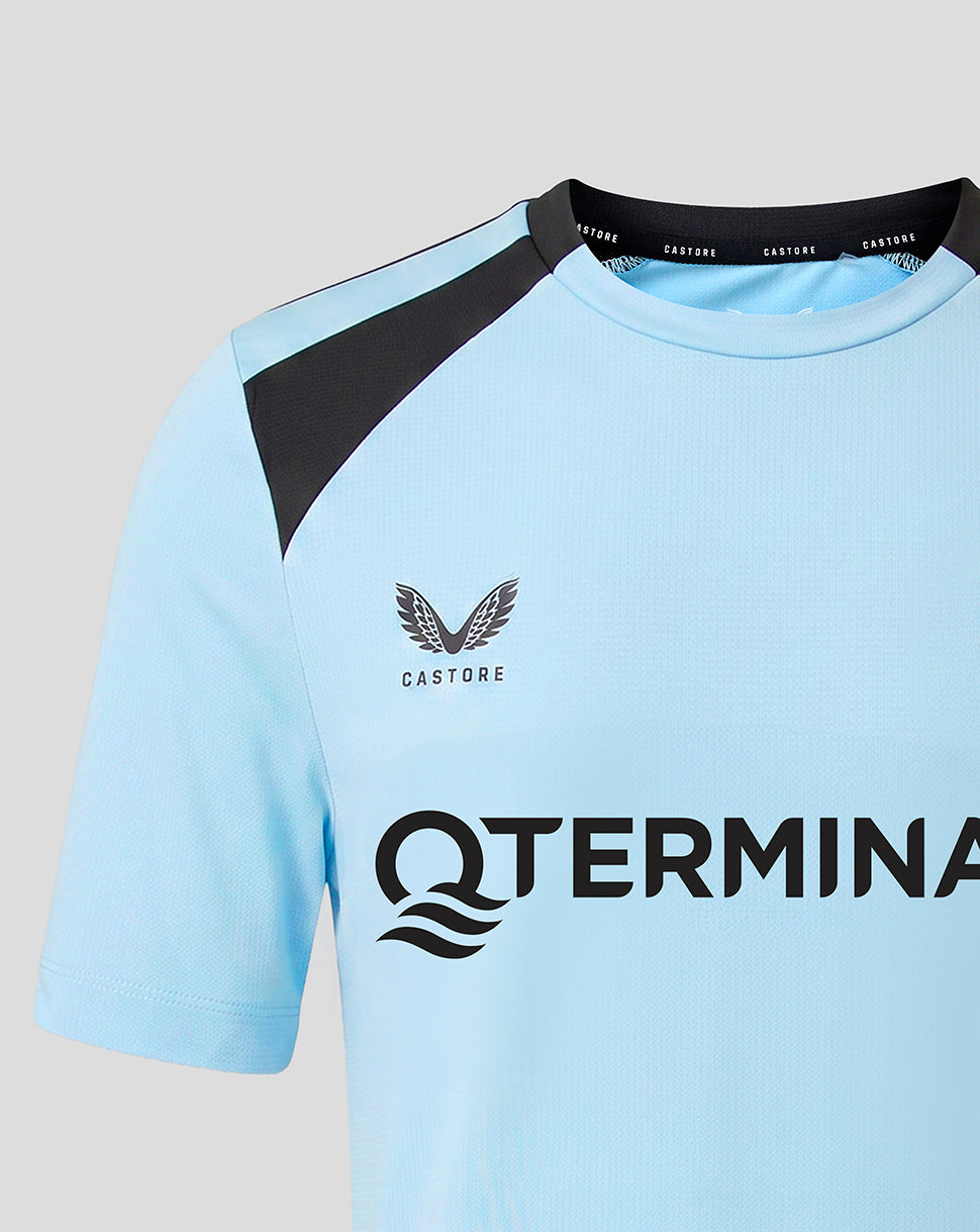 Light blue Feyenoord Junior training shirt with black shoulder panels and Castore branding.