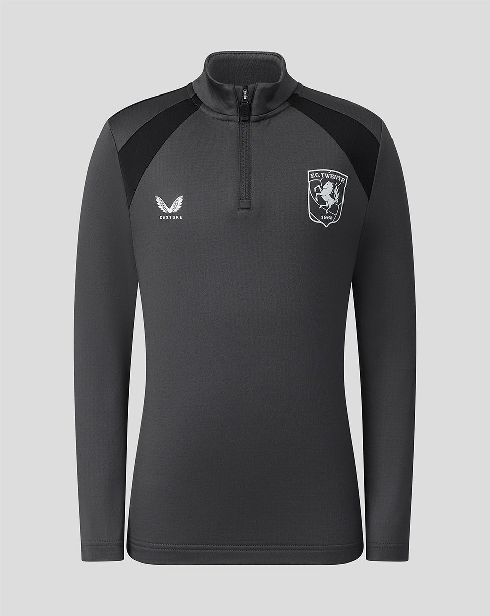 FC Twente training mid layer top junior gunmetal gray with funnel neck zipper and team crest on the chest.