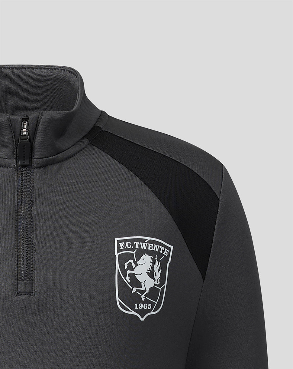 Close-up of the zipper and chest crest on the FC Twente training mid layer top in gunmetal gray.