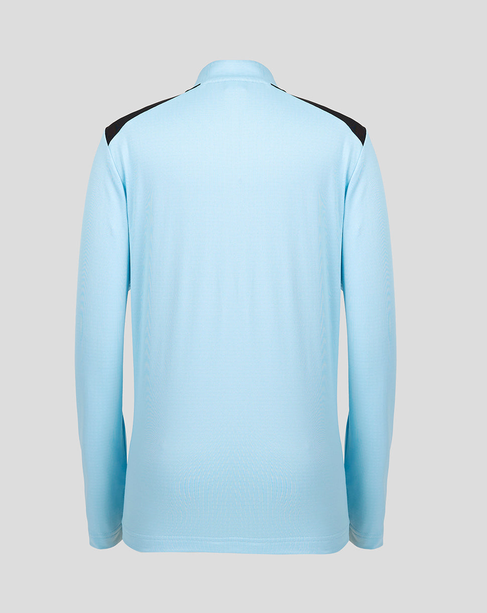 Back view of a junior Feyenoord training top in light blue with black shoulder panels.