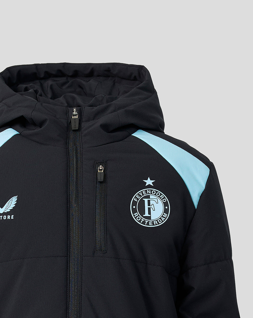 Feyenoord junior training padded jacket in black with light blue shoulder panels and club crest on chest.
