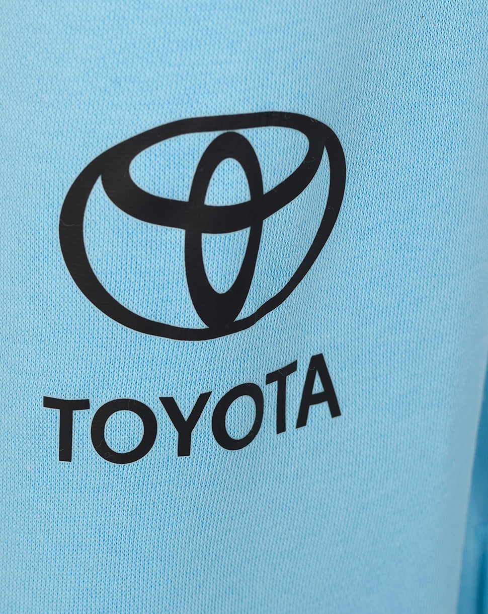 Black Toyota logo on a light blue background