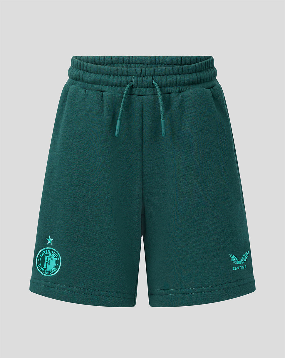 Green Feyenoord junior travel shorts with the club crest on the left leg and Castore logo on the right.