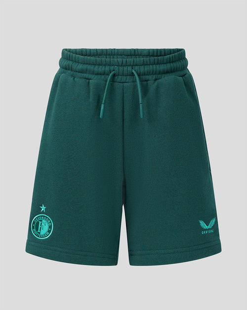 Green Feyenoord junior travel shorts with the club crest on the left leg and Castore logo on the right.