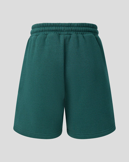 Back view of green Feyenoord travel shorts with an elastic drawstring waistband.