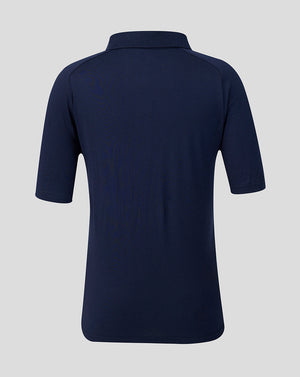 Navy blue polo shirt on a light gray background