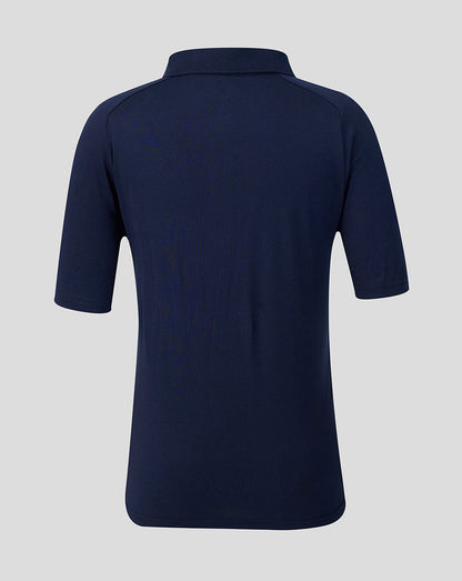Navy blue polo shirt on a light gray background
