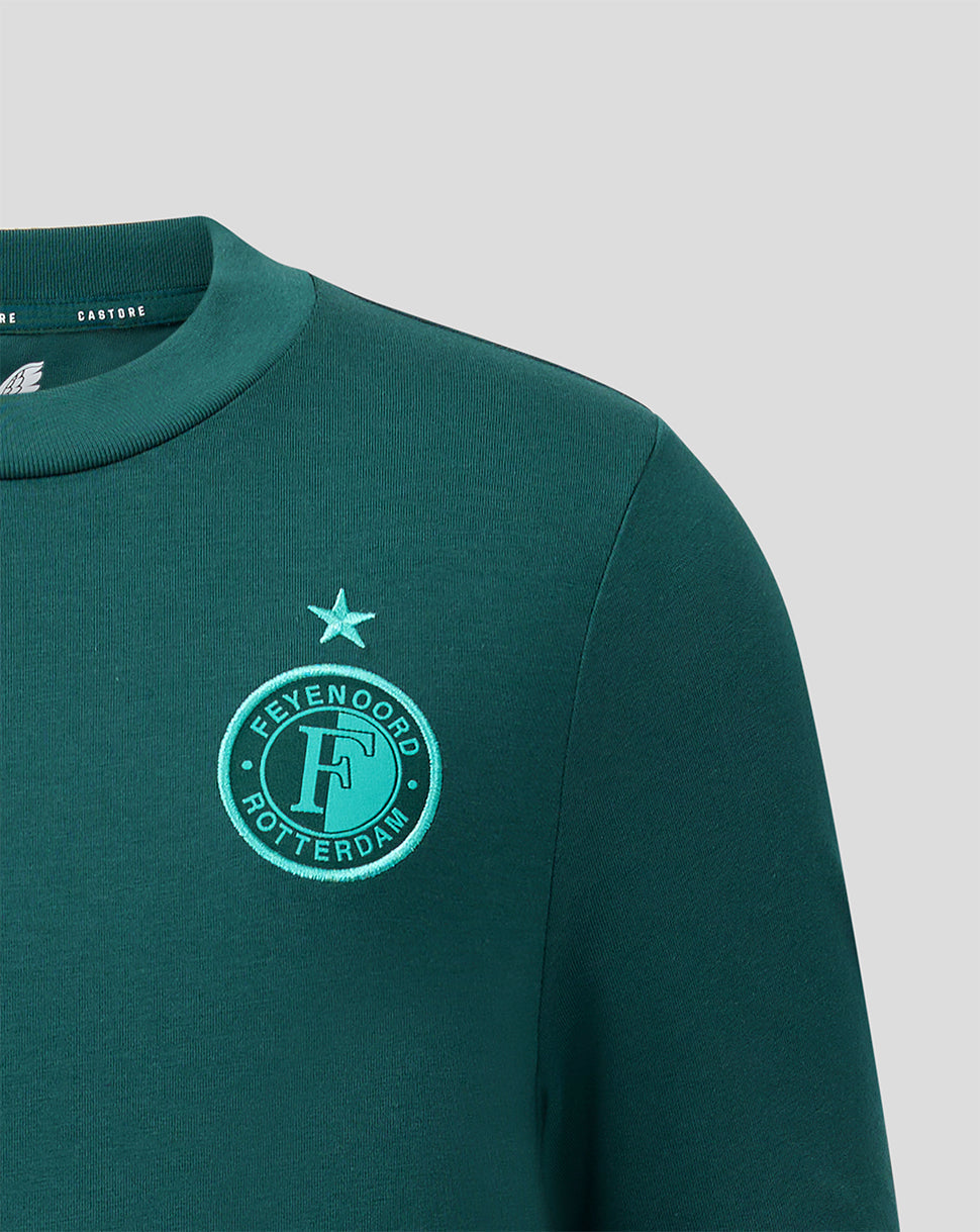 Front left chest of green Feyenoord Travel Shirt with embroidered club crest and star