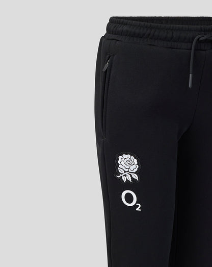 Black pants with a white logo on a light gray background