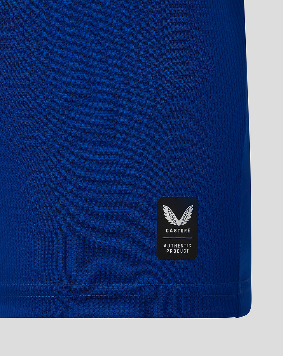 Blue garment with a Castore logo on a light gray background