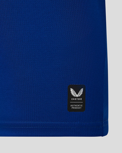 Blue garment with a Castore logo on a light gray background