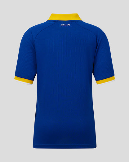 Blue sports jersey with yellow accents on a gray background
