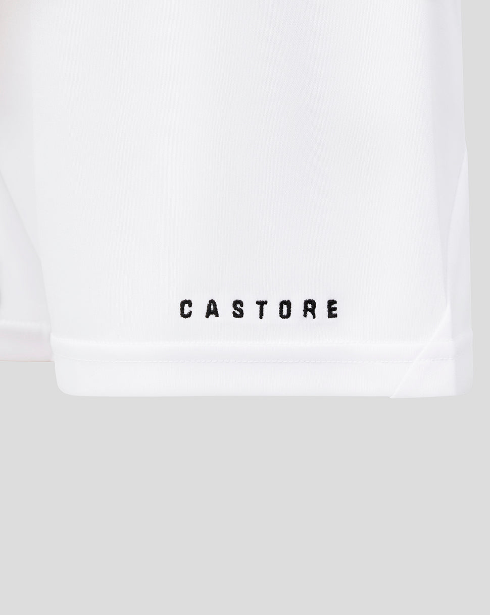 White shorts with 'CASTORE' logo on a light gray background