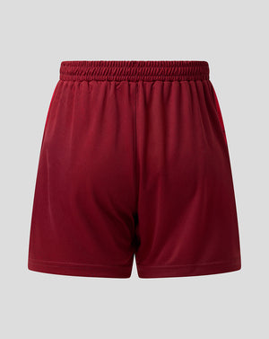 A pair of athletic shorts in a deep burgundy red, featuring an elastic waistband and side pockets, shown against a solid light gray background.