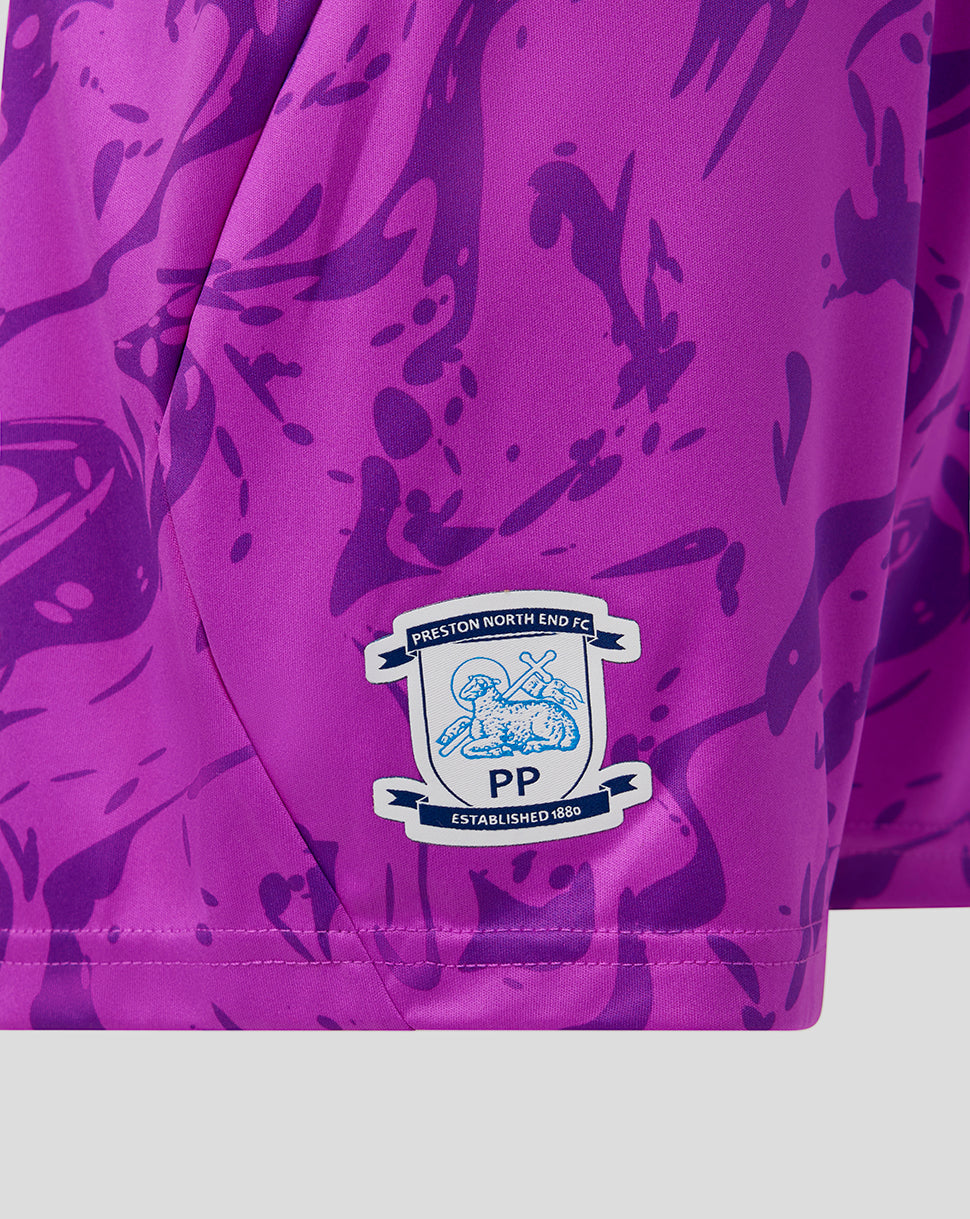 Purple sports shorts with a logo and text on a white background