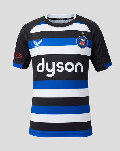 A short-sleeve soccer jersey with horizontal black, white, and blue stripes, featuring the 'dyson' sponsor logo across the chest, the Bath Rugby crest on the left chest, and the Castore brand logo on the right chest, shown against a solid gray background.