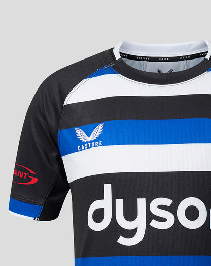 Close-up of a rugby jersey with horizontal black, white, and blue stripes, featuring the Castore logo on the chest and a large white dyson logo across the front.