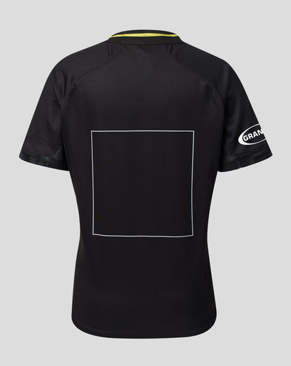 Black short-sleeve athletic jersey shown from the back, featuring a large white square outline on the back, a yellow inner collar, and a white Grailed logo on the right sleeve, set against a solid gray background.