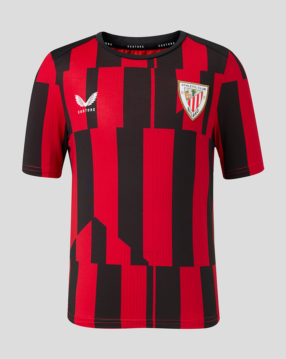 Front view of Athletic Club Matchday shirt in red and black geometric blocks with club crest on the left chest and Castore logo on the right.