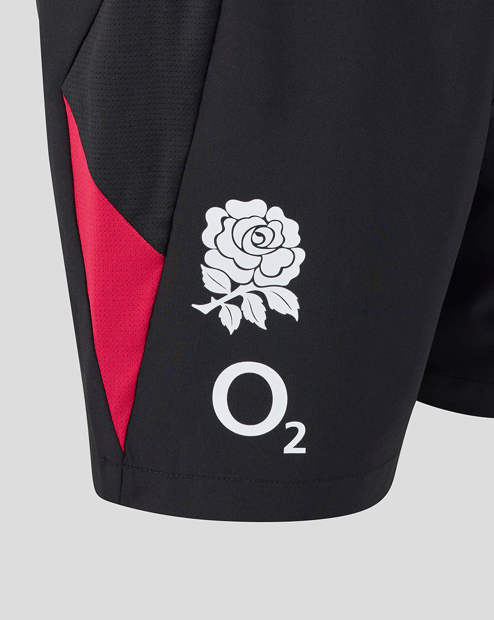 Black sports shorts with red accents and a white rose emblem on a gray background
