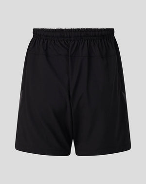 Black athletic shorts with an elastic waistband, shown against a solid light gray background.