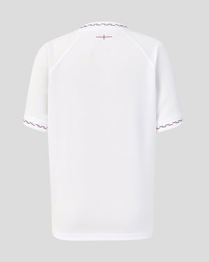 White t-shirt with red and black design on a gray background
