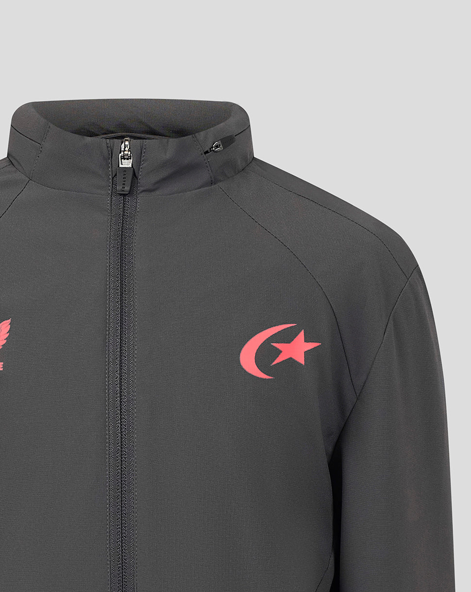 A close-up of a dark gray zip-up jacket featuring a red crescent and star logo on the left chest, set against a solid light gray background.