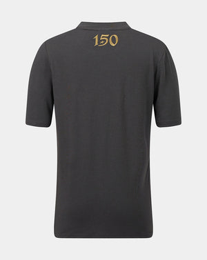 A dark gray short-sleeve polo shirt shown from the back, featuring a gold '150' graphic printed on the upper back, set against a light gray background.