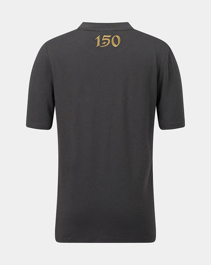 A dark gray short-sleeve polo shirt shown from the back, featuring a gold '150' graphic printed on the upper back, set against a light gray background.