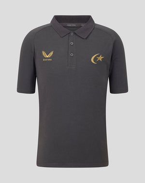 A dark gray short-sleeve polo shirt with gold embroidered logos on the chest, displayed on a solid light gray background.