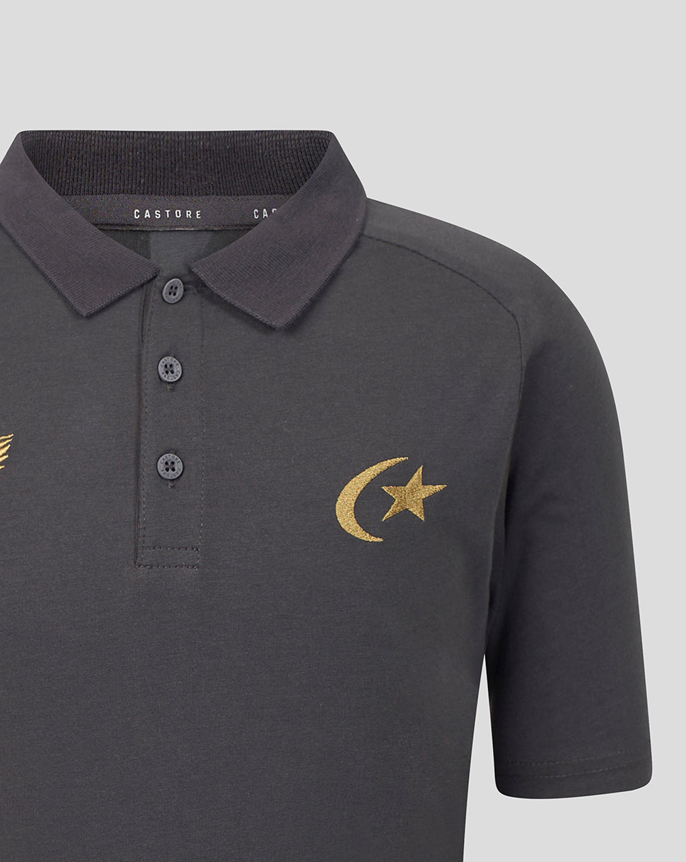 A close-up of a dark gray short-sleeve polo shirt with a gold embroidered crescent moon and star on the left chest, featuring a three-button placket and a dark gray ribbed collar.