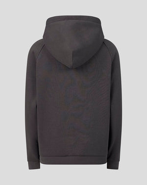 A dark charcoal gray pullover hoodie shown from the back, featuring a subtle tonal pattern and raglan sleeves, set against a solid light gray background.