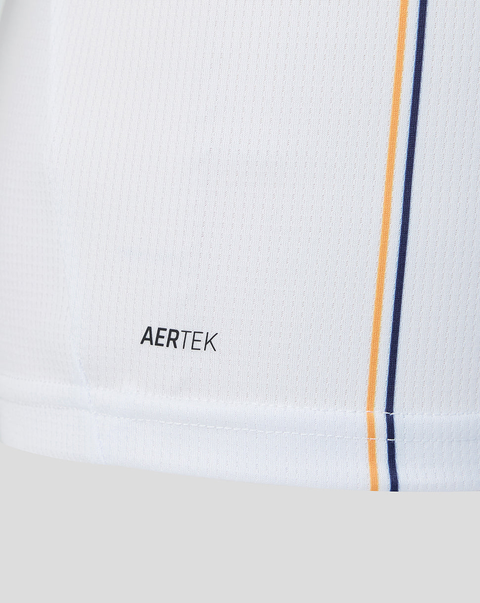 Bottom hem of white Everton junior away shirt with AERTEK branding and navy blue stripe trim