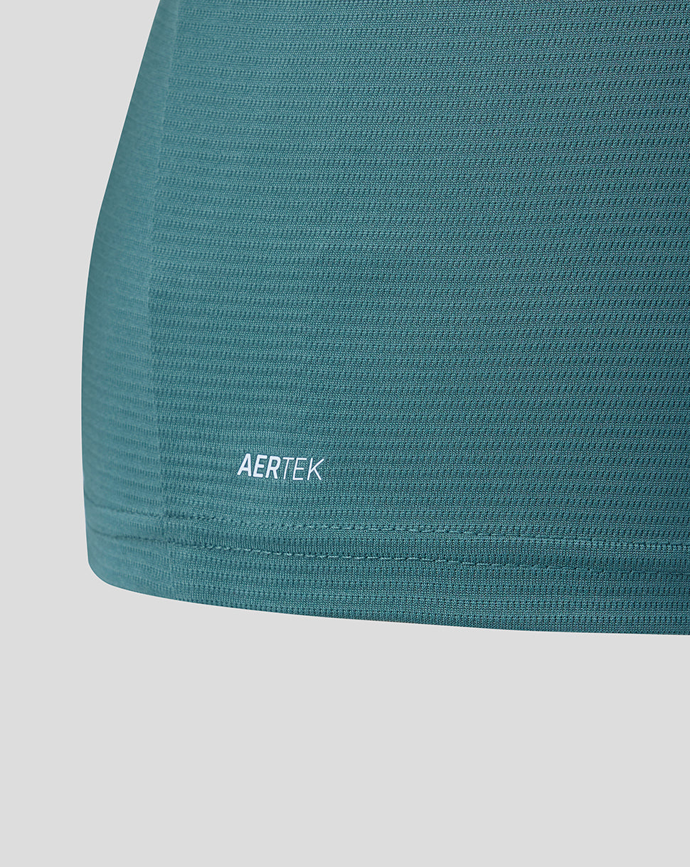 Close up of teal Everton Junior 26/27 Third Short Sleeve Shirt hem with AERTEK branding.
