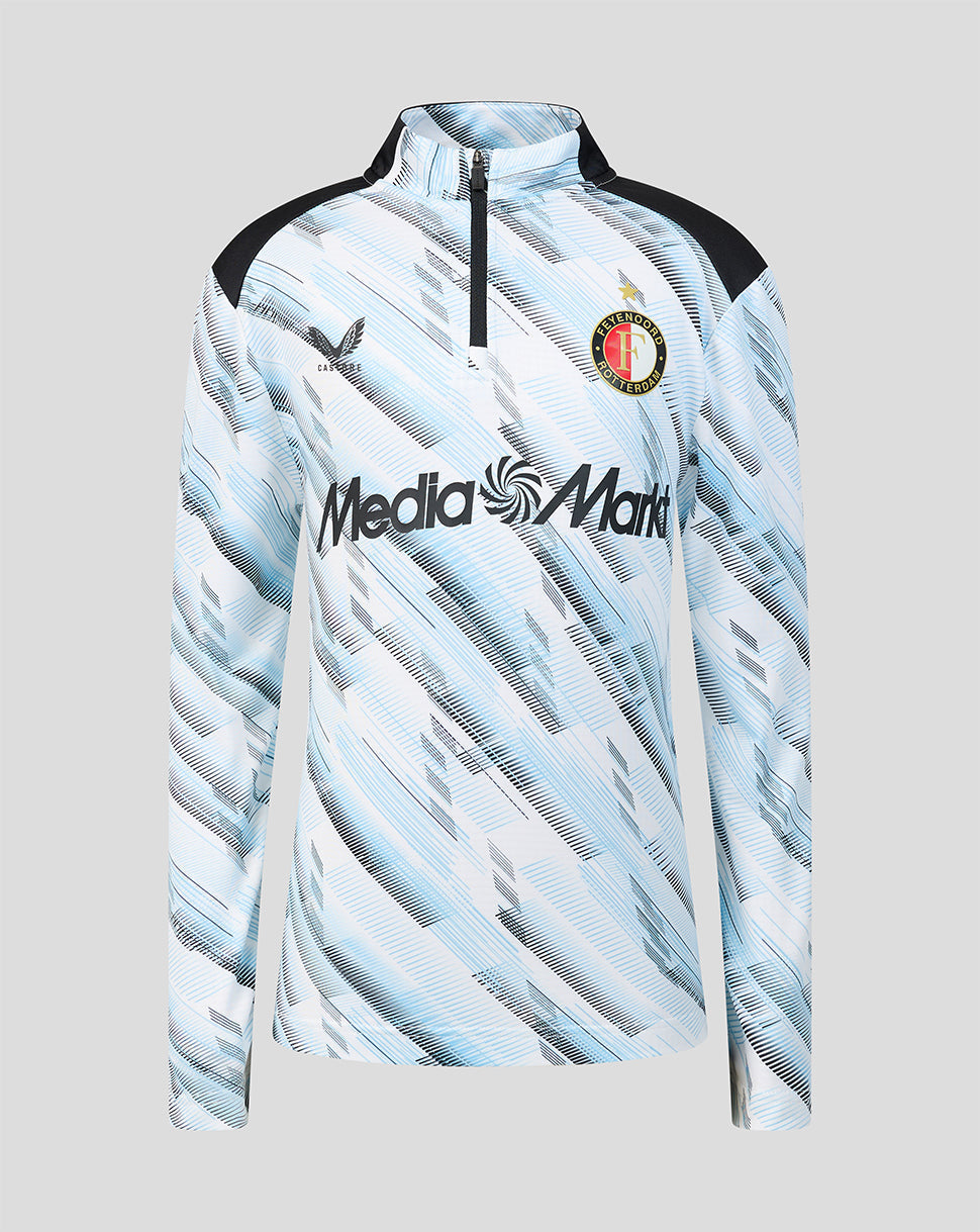Front view of Feyenoord Junior away midlayer with light blue abstract pattern, quarter zip, black shoulder panels and crest left chest.