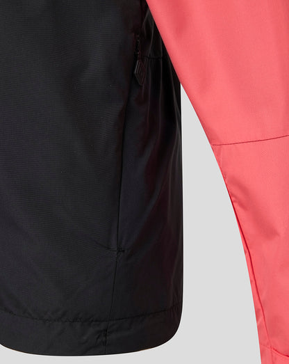 Close-up of a black and pink jacket on a light gray background